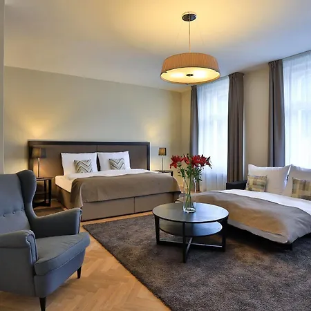 & Aparthotel