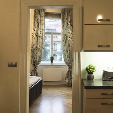 Modern Vsehrdova Apartment *